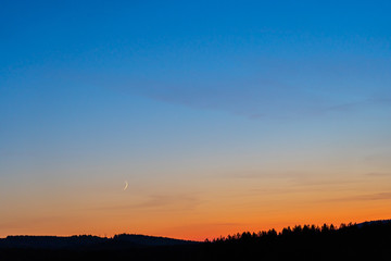 Fototapeta na wymiar Colorful clear sky with no clouds at dusk after sunset.