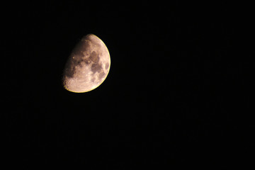 close-up of half moon on black sky background