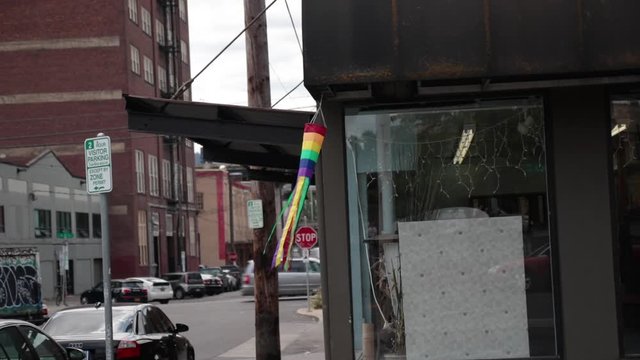 rainbow wind sock dancing portland east side shop window