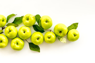 Autumn composition with green apple on white background top view copy space