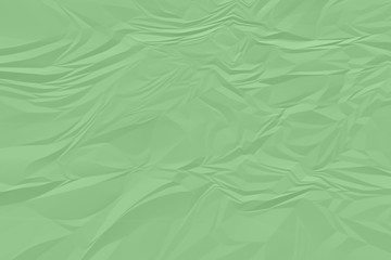 crumpled green paper background close up