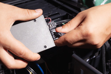 installation and connection of an SSD hard drive by the hands of a computer wizard