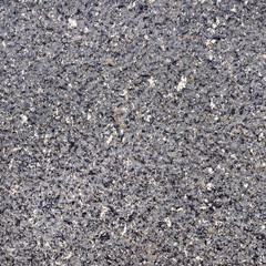 Seamless dark grey granite stone texture. Material construction.