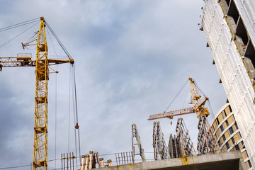 construction crane on a cloudy day construction