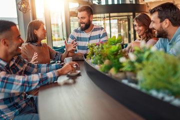 Friends having a coffee together