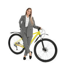 Fototapeta na wymiar Young businesswoman with bicycle on white background