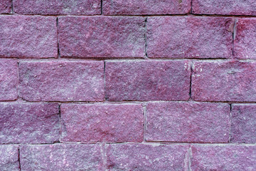 old pink brick wall close up