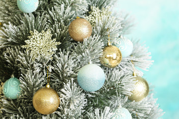 Fototapeta na wymiar Beautiful Christmas tree with beautiful festive decor, closeup