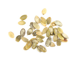 Raw peeled pumpkin seeds on white background, top view