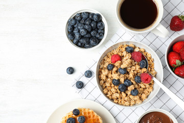 Tasty breakfast served on white wooden table, flat lay