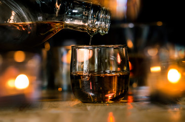 Bartender Serve Whiskey, on wood bar, 