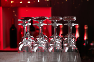 Empty clean glasses on counter in bar