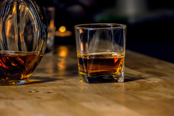 Bartender Serve Whiskey, on wood bar, 