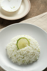 Cilantro lime in white dish,lemon on rice