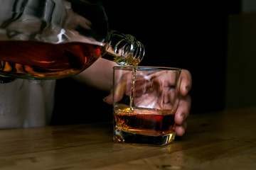 Bartender Serve Whiskey, on wood bar