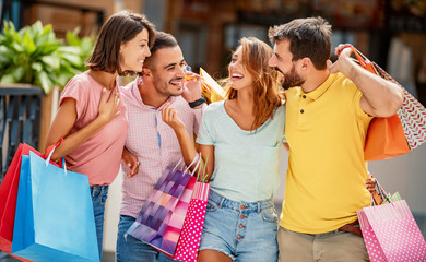 Friends enjoying shopping in the city
