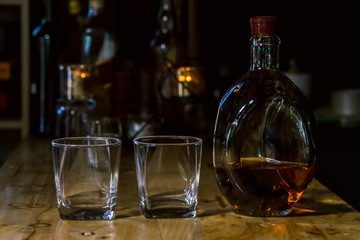 Fototapeta na wymiar Bartender Serve Whiskey, on wood bar, 