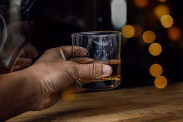 Bartender Serve Whiskey, on wood bar, 