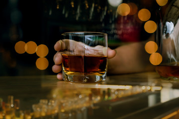 Bartender Serve Whiskey, on wood bar