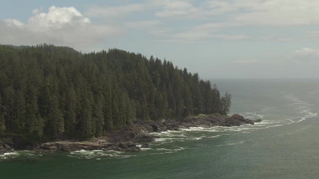 Beautiful Aerial Landscape View of the Rocky Pacific Ocean Coast in the Southern Vancouver Island during a sunny summer day. Taken between Victorial and Port Renfrew, BC, Canada.