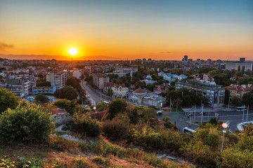 Autumn sunset view over Plovdiv city, Bulgaria. European capital of culture 2019 and the oldest living city in Europe. Photo from one of the hills in the city.
