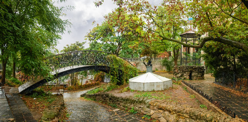 City garden in rain. Park Old Odesa Corner, Ukraine
