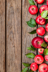 Naklejka na ściany i meble Red Apples on Old Wood Background
