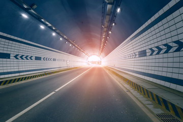 Fototapeta na wymiar Car driving on to tunnel.