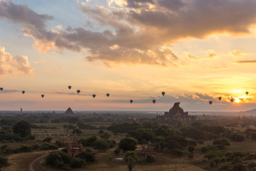 Dawn over the ancient Pagan city, Myanmar. The view from the top of Shwesandaw Temple.  View of Dhammayangyi Temple.