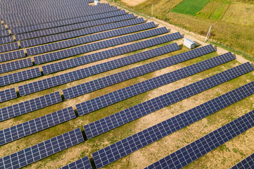 Aerial view of solar power plant. Electric panels for producing clean ecologic energy.