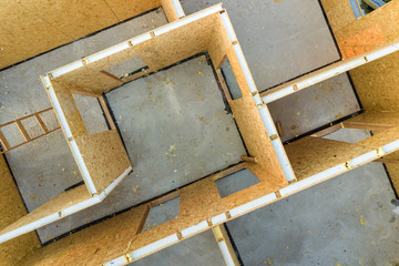Construction of new and modern modular house. Walls made from composite wooden sip panels with...