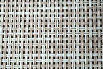 plastic knitted texture, beige color close up