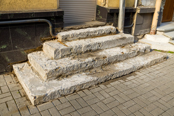 Old ruined concrete stairs before renovation works.