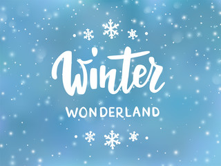 Winter wonderland text, hand drawn brush lettering. Holiday greetings quote. Blue background with falling snow effect.