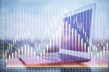 Forex market chart hologram and personal computer background. Double exposure. Concept of investment.