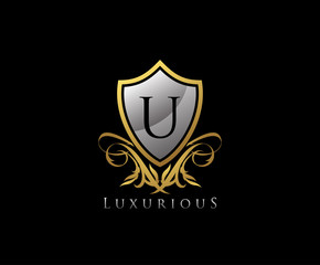 Classy Shield Letter U Gold Letter Logo Icon.