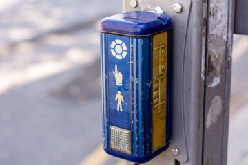 Traffic light control button with crosswalk scheme for blind people . Blind Pimple. Israel