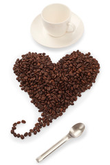 cup of coffee with beans on white background