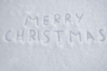 text merry christmas on snow