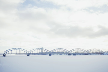 A view of the on winter Bridge over Daugava river in Riga, Latvia