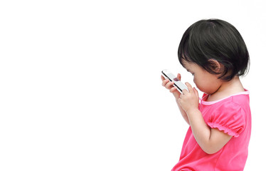 Asian kid playing with a smartphone isolated