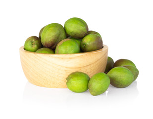 Chebulic Myrobalans in wood bowl isolated on white background, herb and medical