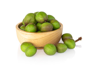 Chebulic Myrobalans in wood bowl isolated on white background, herb and medical