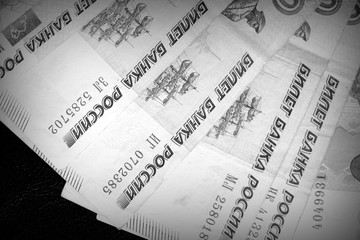 Russian rubles close-up black and white. Money background