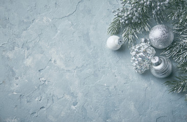 Naklejka na ściany i meble Silver Christmas ornaments on rustic background. Flat lay. Copy space