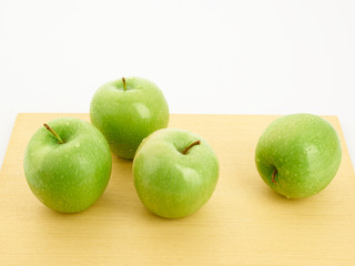 green apple on a plate