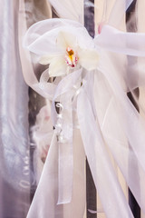 White orchid and veil wedding decoration