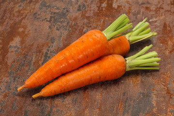 Three Young fresh ripe carrot