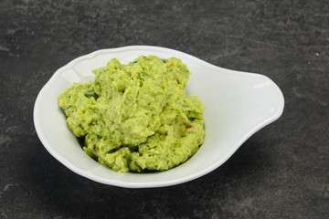 Avocado guacamole sauce with chili pepper