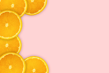 Slices orange on pink background. Background and pattern concept